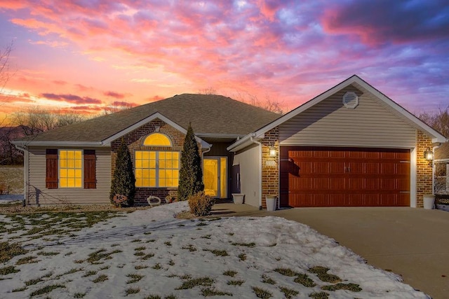 single story home with a garage