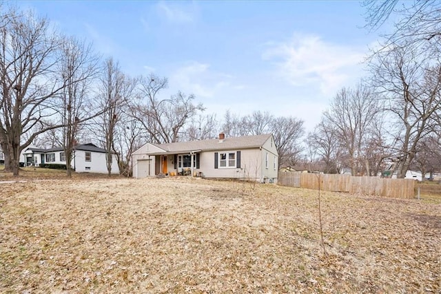 single story home featuring a garage