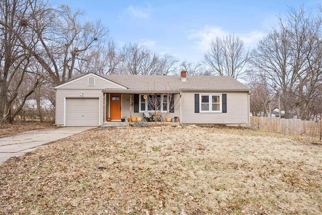 single story home with a garage and a porch