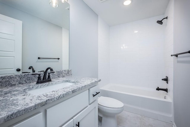 full bathroom with shower / washtub combination, vanity, toilet, and tile patterned floors