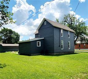 view of home's exterior featuring a lawn