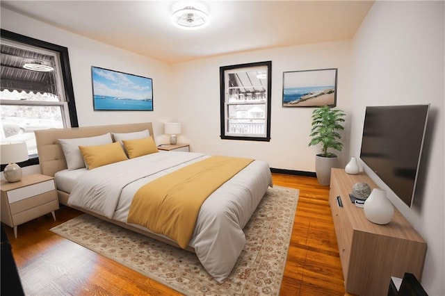 bedroom with light wood-type flooring