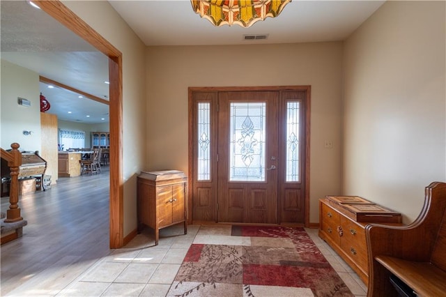 view of tiled foyer