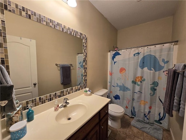 bathroom with decorative backsplash, vanity, toilet, a textured ceiling, and a shower with curtain