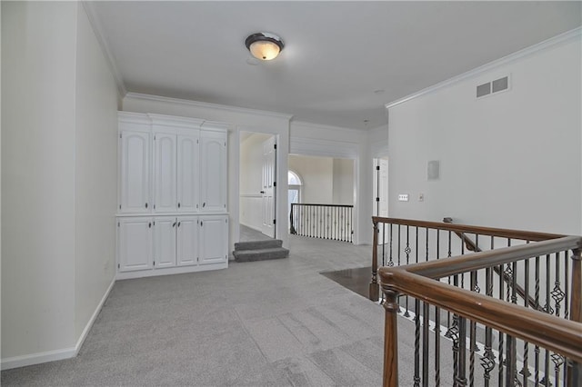 corridor with light carpet and ornamental molding