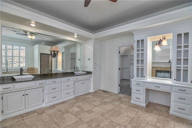 bathroom featuring ceiling fan and vanity