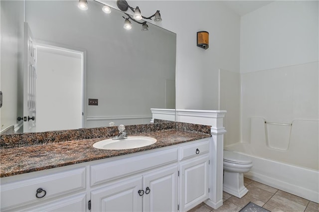 full bathroom featuring tile patterned flooring, vanity, shower / tub combination, and toilet