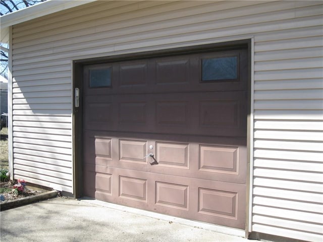 garage featuring driveway