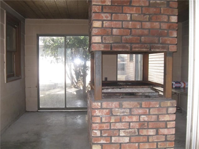 details featuring wooden ceiling and concrete floors