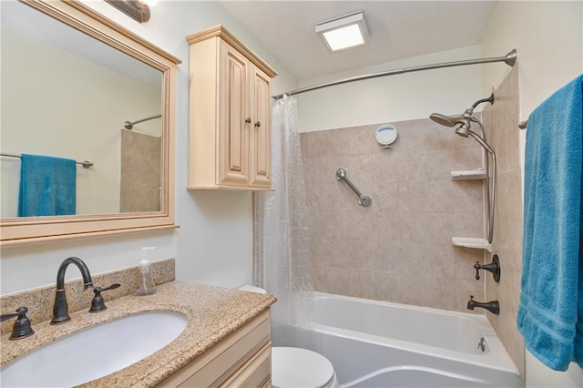 full bathroom featuring vanity, shower / bathtub combination with curtain, and toilet