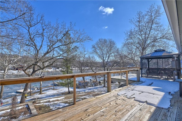 snow covered deck with a gazebo