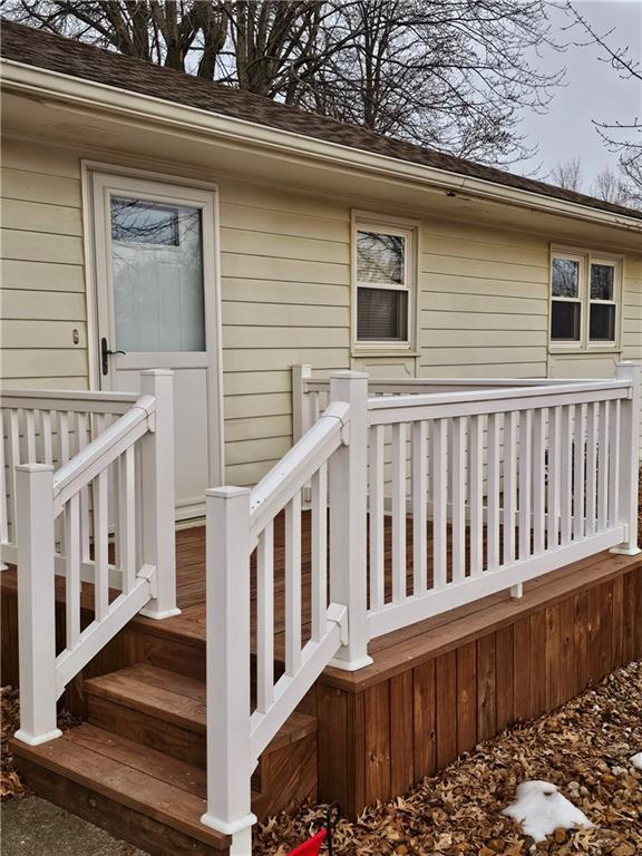 doorway to property featuring a deck