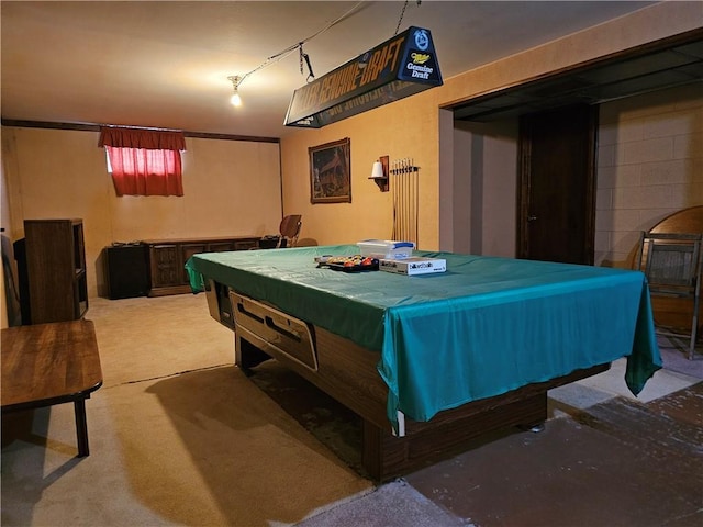 game room with pool table and light colored carpet