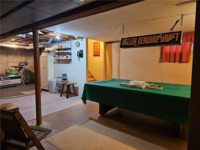 game room with visible vents and finished concrete floors