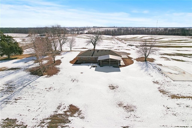 snowy aerial view with a rural view