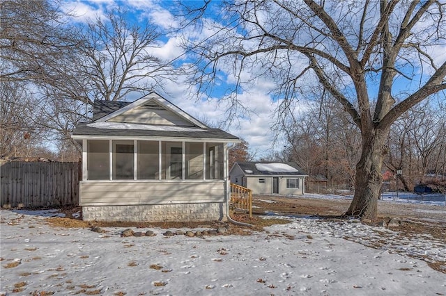 exterior space with a sunroom