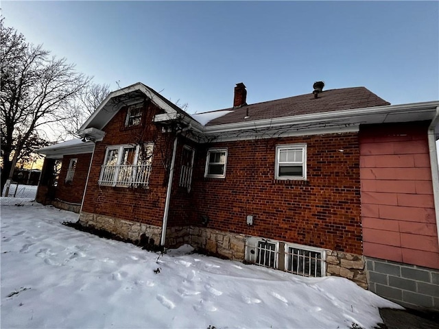 view of snow covered property