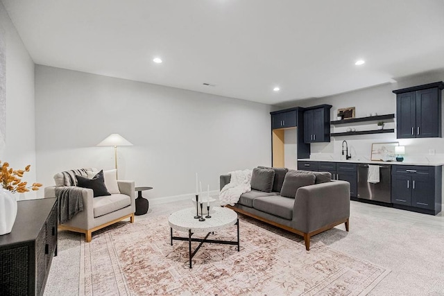 living room featuring sink