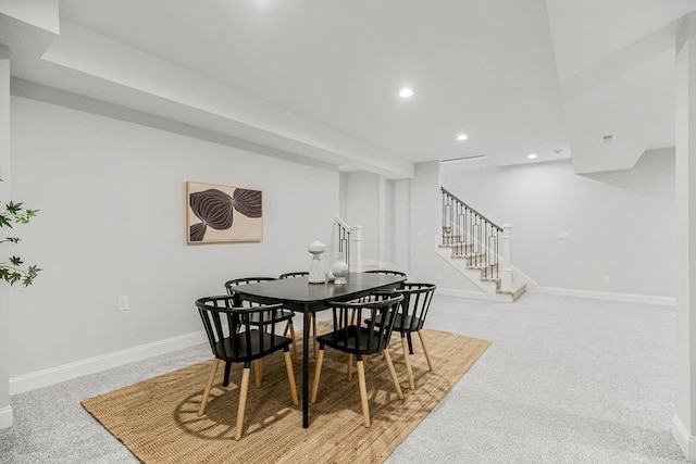 dining room featuring carpet flooring