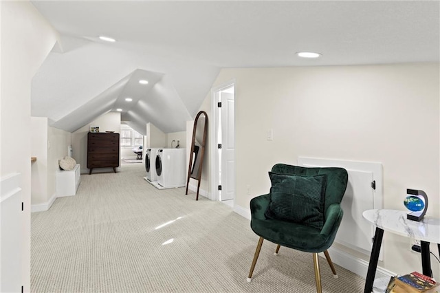 living area with carpet, baseboards, washing machine and clothes dryer, recessed lighting, and vaulted ceiling