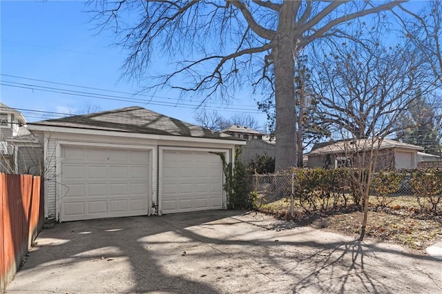 detached garage with fence