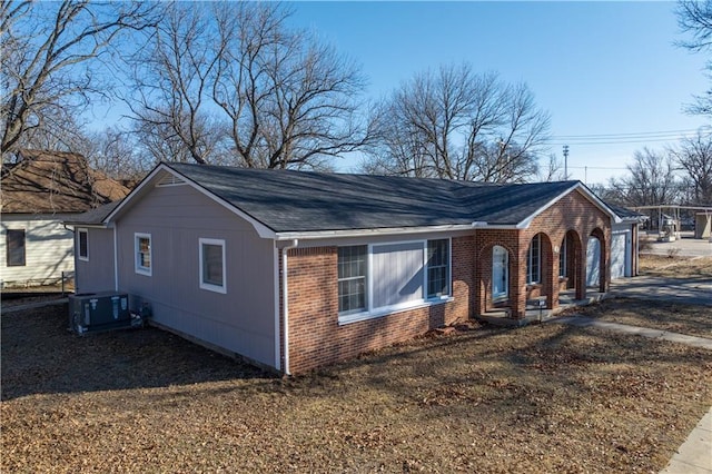 view of home's exterior with cooling unit