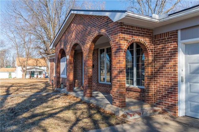 view of side of home featuring a garage