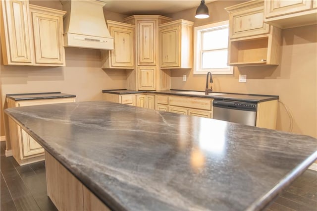 kitchen with sink, light brown cabinets, dark hardwood / wood-style floors, dishwasher, and custom range hood