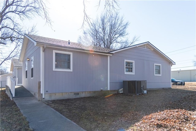 back of property with central air condition unit