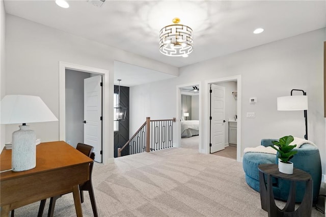 interior space featuring light colored carpet and a notable chandelier