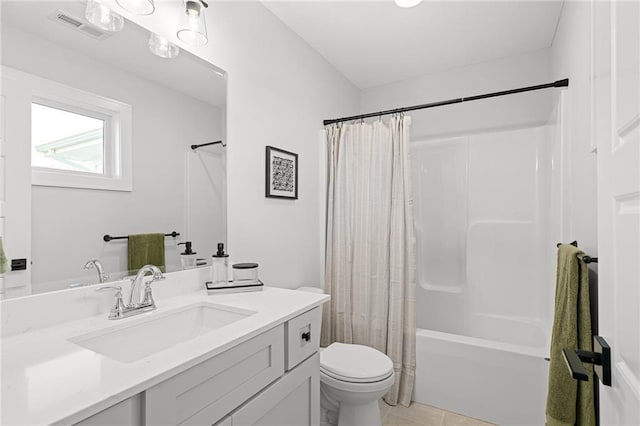 full bathroom featuring vanity, toilet, and shower / bath combo with shower curtain