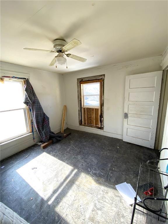 empty room with ceiling fan