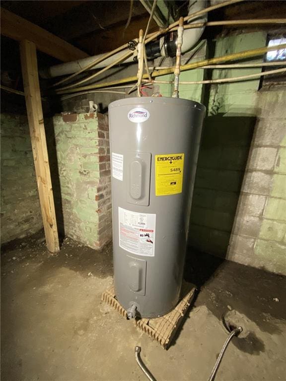 utility room with electric water heater