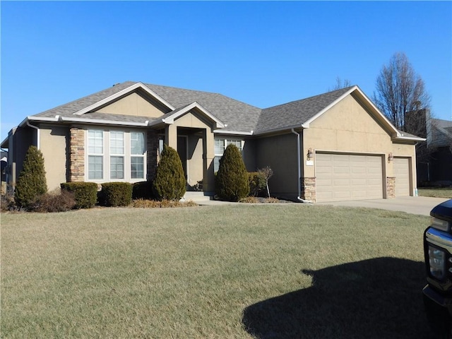 single story home featuring a garage and a front yard