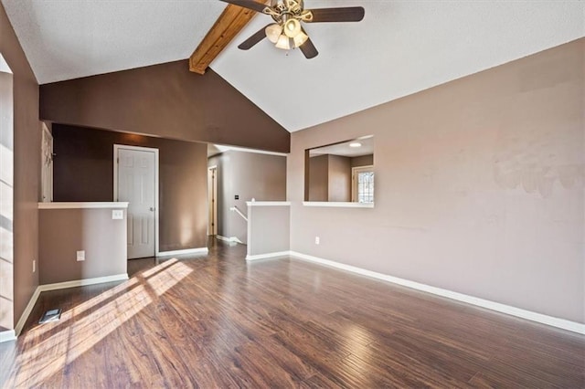 unfurnished living room featuring vaulted ceiling with beams, dark wood-type flooring, and ceiling fan