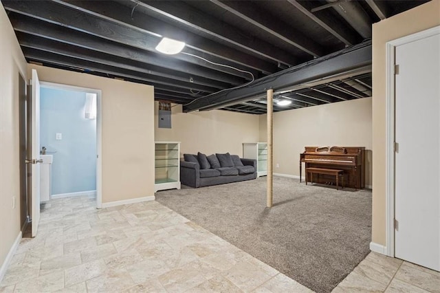 basement with electric panel and light carpet