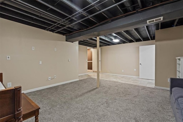 basement featuring carpet flooring