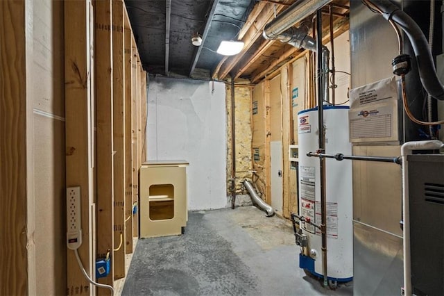 basement featuring heating unit and water heater