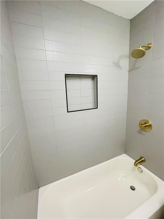 bathroom featuring shower / tub combination