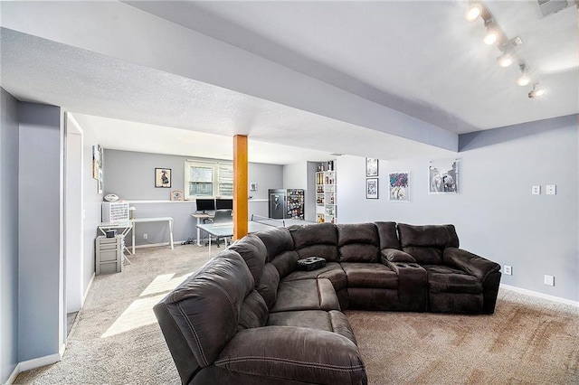 living room with light carpet and track lighting