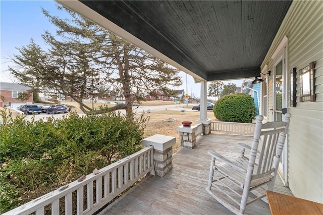 deck with covered porch