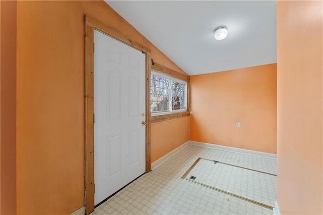 interior space featuring vaulted ceiling