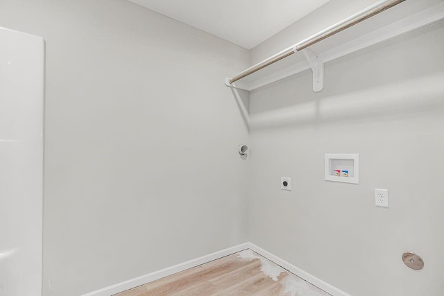 laundry room featuring laundry area, baseboards, wood finished floors, hookup for a washing machine, and electric dryer hookup