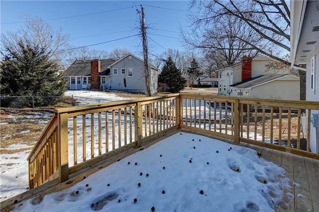 view of snow covered deck