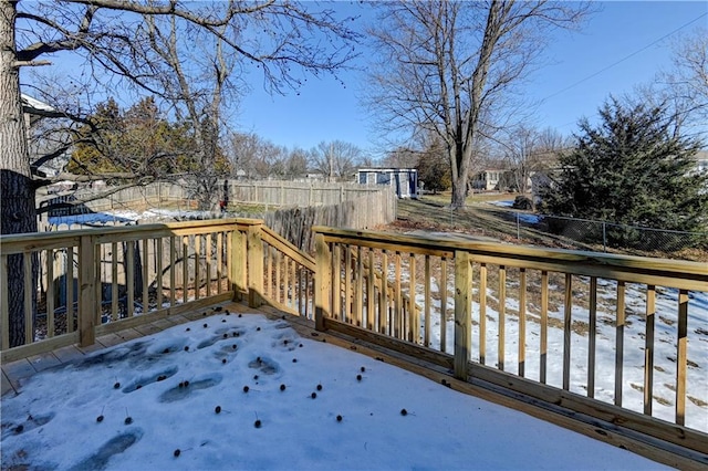 view of snow covered deck