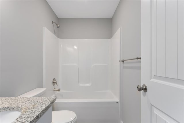 702 Winter Dr, Belton, MO 64012 - full bathroom featuring shower / washtub combination, toilet, and vanity
