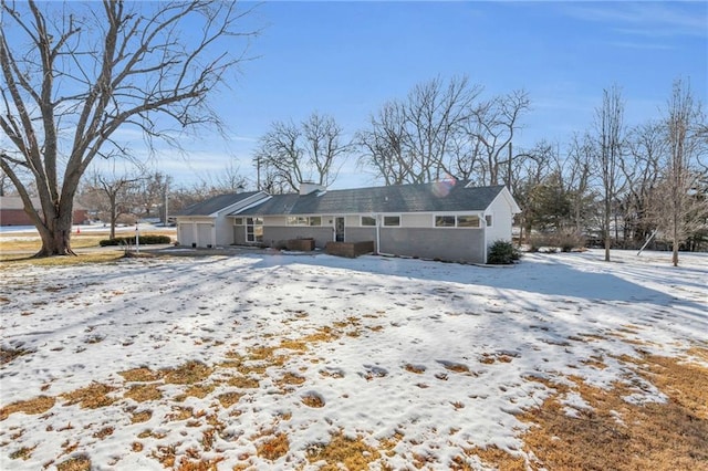 view of snow covered property