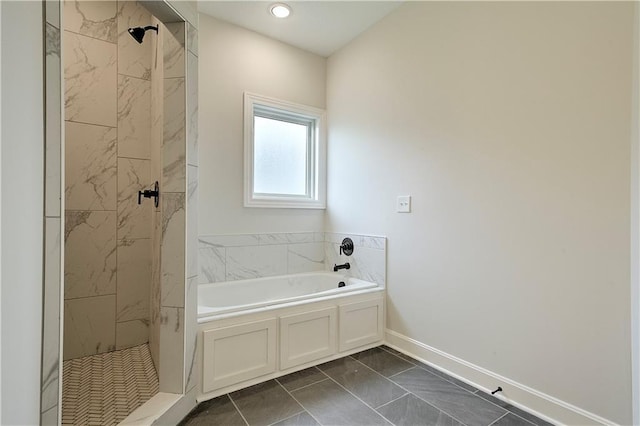 bathroom with shower with separate bathtub