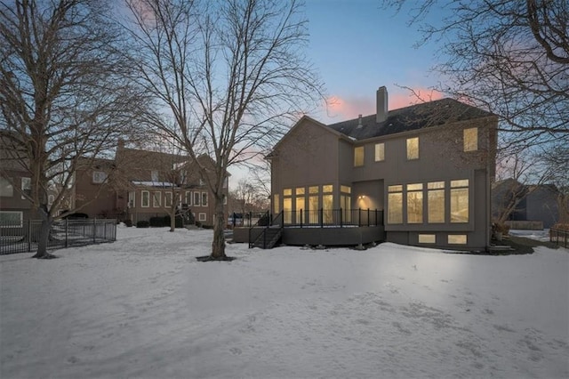 view of snow covered property