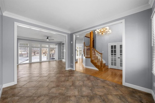 unfurnished living room featuring an inviting chandelier, crown molding, and french doors